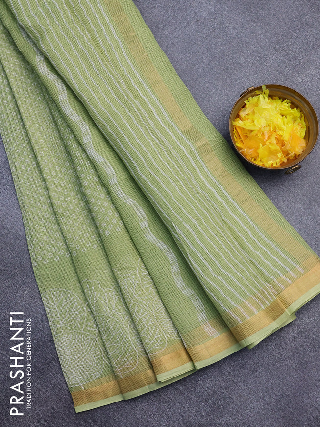 Kota saree pista green with allover butta prints and zari woven border