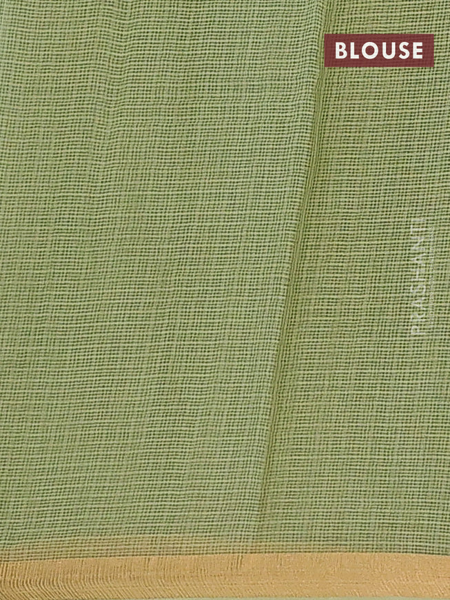 Kota saree pista green with allover butta prints and zari woven border