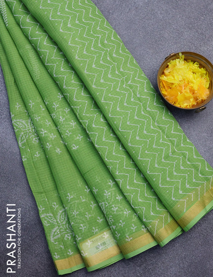 Kota saree light green with butta prints and zari woven border