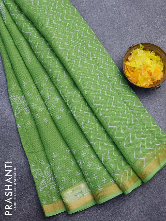 Kota saree light green with butta prints and zari woven border