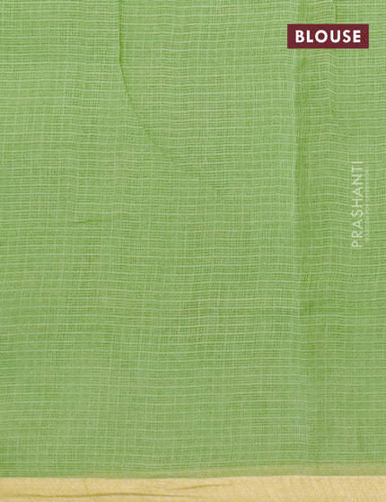 Kota saree light green with butta prints and zari woven border