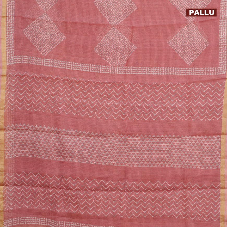 Kota saree pastel pink with allover bandhani prints and zari woven border
