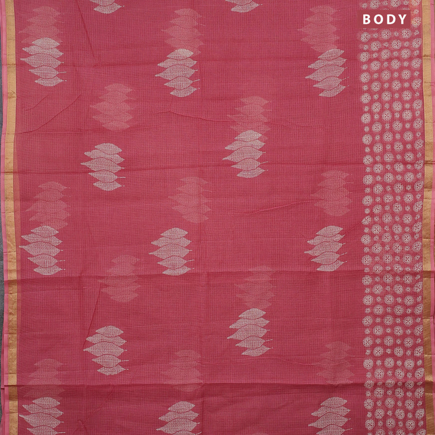 Kota saree peach pink shade with leaf butta prints and zari woven border