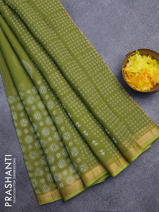 Kota saree mehendi green with leaf butta prints and zari woven border