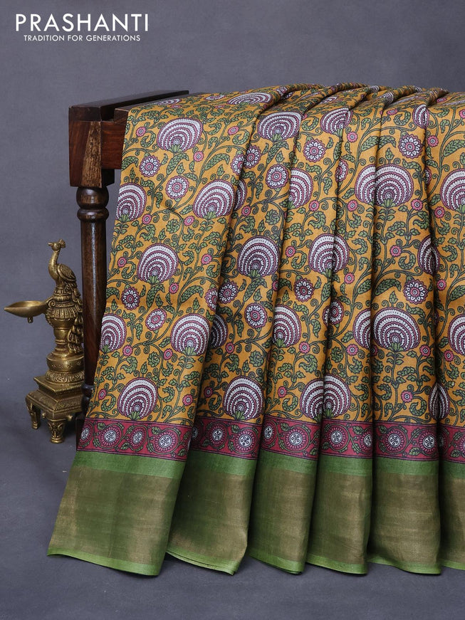 Pure tussar silk saree mustard yellow and green with allover prints and zari woven border -