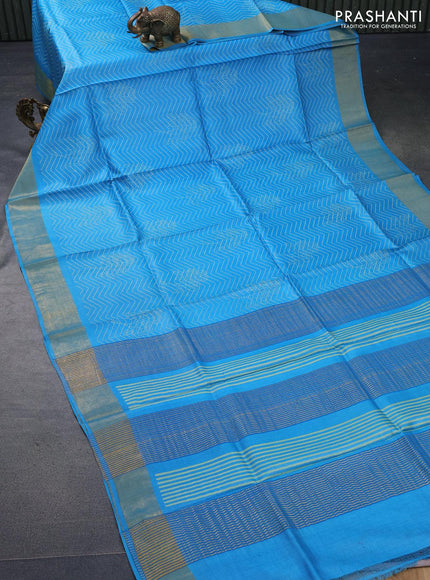 Pure tussar silk saree light blue with allover prints and zari woven border -