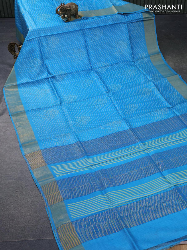 Pure tussar silk saree light blue with allover prints and zari woven border -