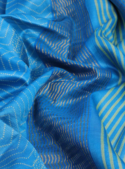 Pure tussar silk saree light blue with allover prints and zari woven border -