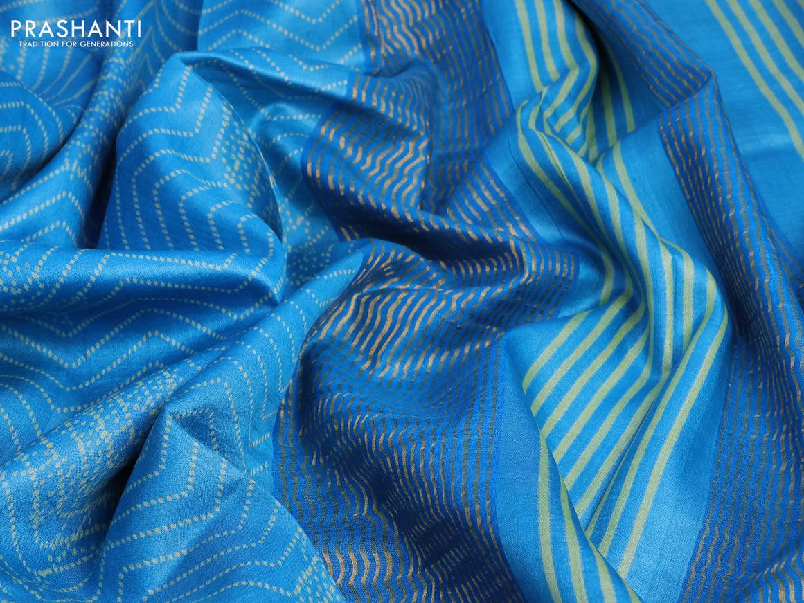 Pure tussar silk saree light blue with allover prints and zari woven border -