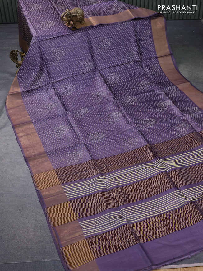 Pure tussar silk saree deep jamun shade with allover prints and zari woven border -