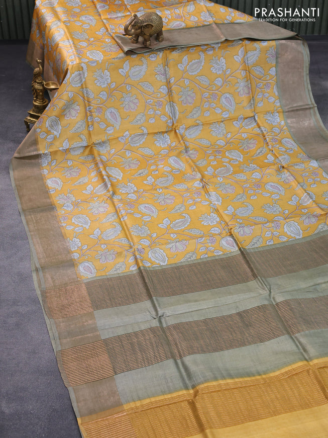 Pure tussar silk saree mustard yellow and elaichi green with kalamkari prints and zari woven border -