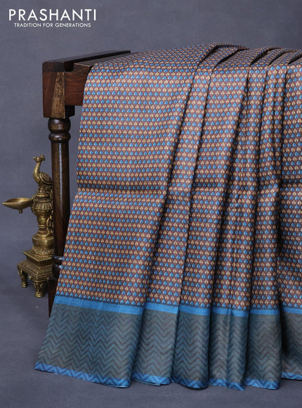 Pure tussar silk saree brown and blue shade with allover prints and zari woven border -