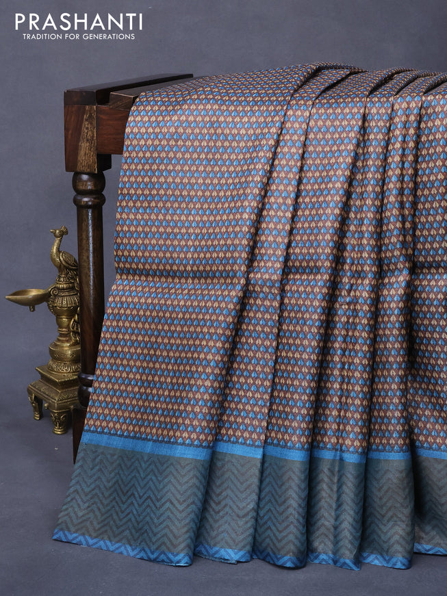 Pure tussar silk saree brown and blue shade with allover prints and zari woven border -