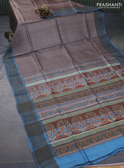 Pure tussar silk saree brown and blue shade with allover prints and zari woven border -