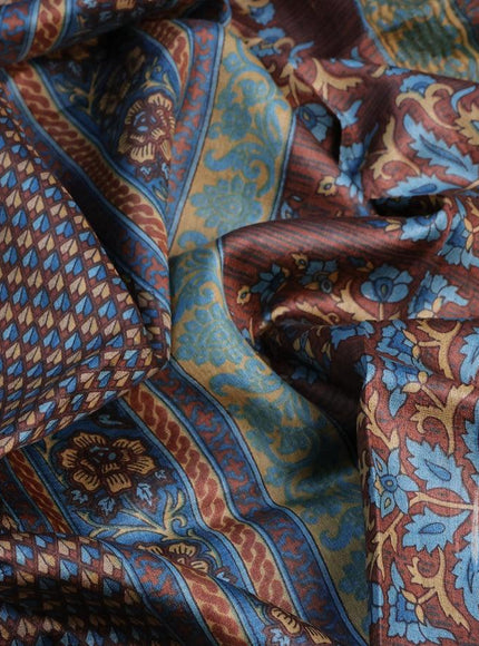 Pure tussar silk saree brown and blue shade with allover prints and zari woven border -