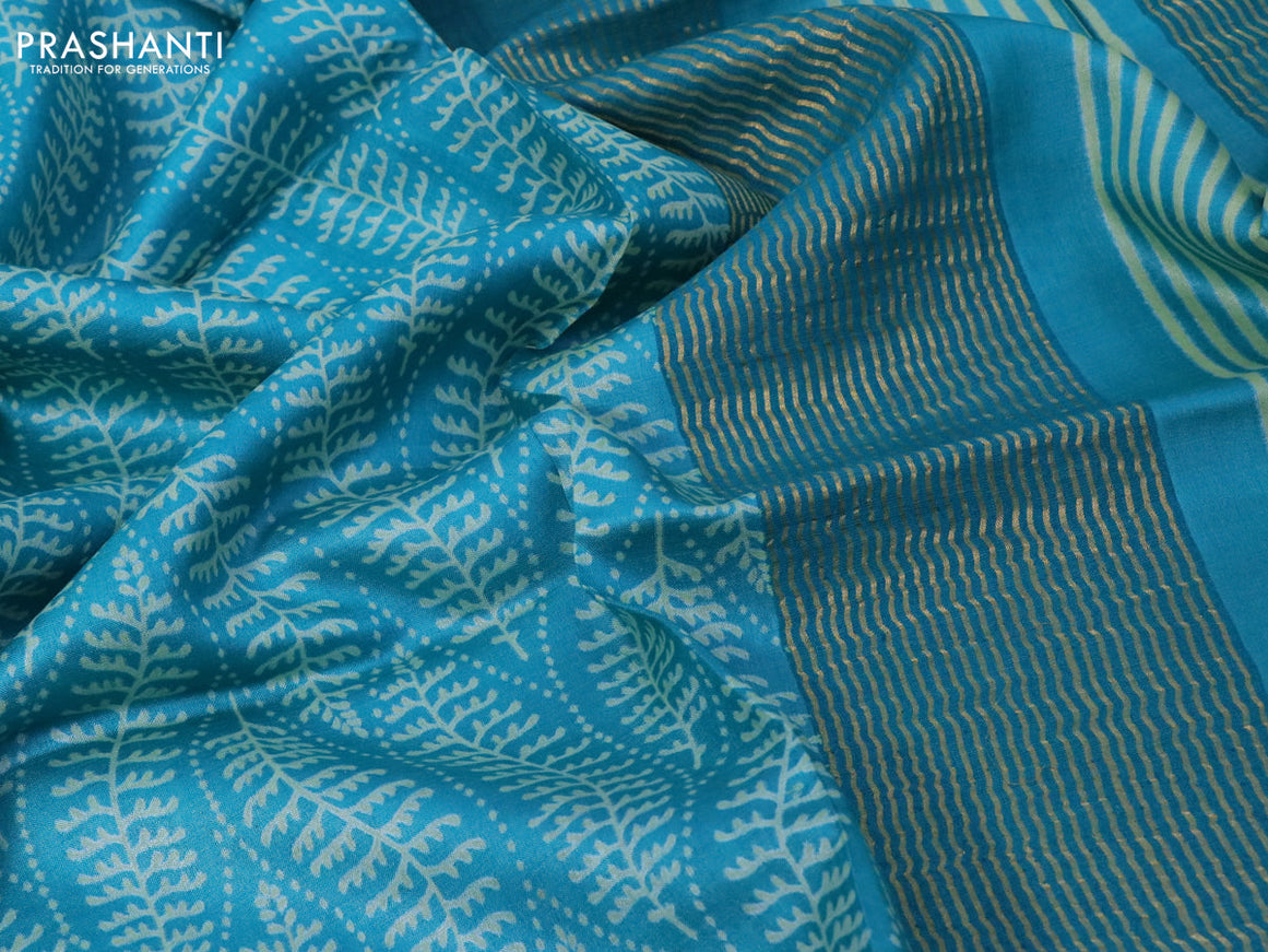 Pure tussar silk saree teal blue with allover prints and zari woven border -