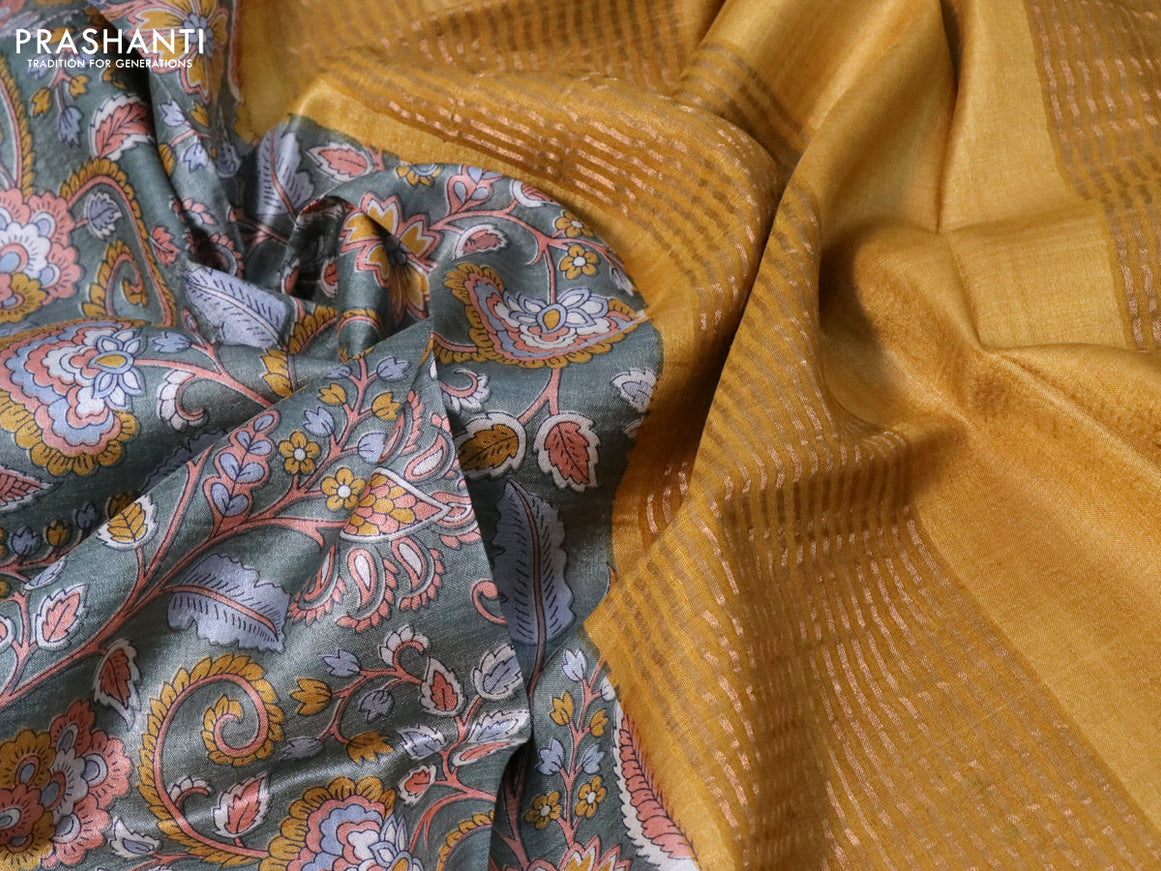 Pure tussar silk saree pastel green and mustard yellow with allover kalamkari prints and zari woven border -