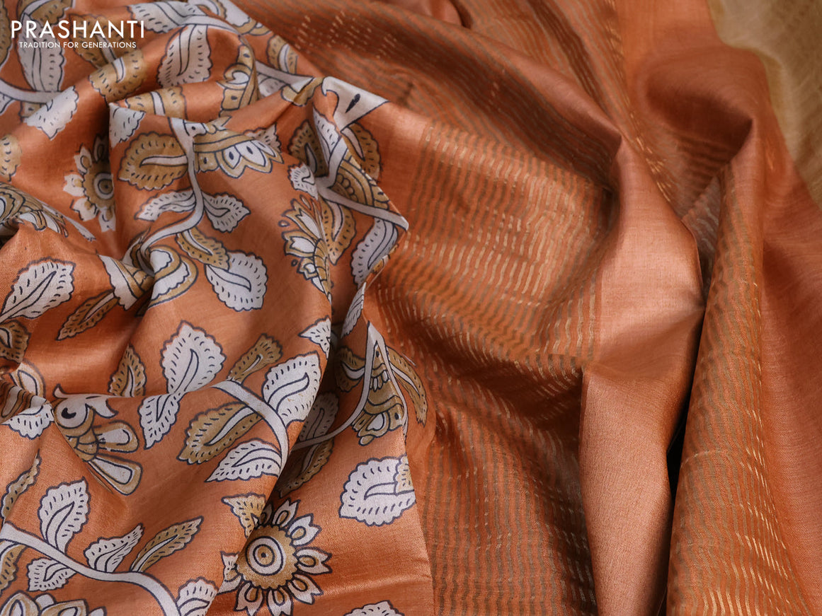 Pure tussar silk saree rustic orange with allover kalamkari prints and zari woven border -