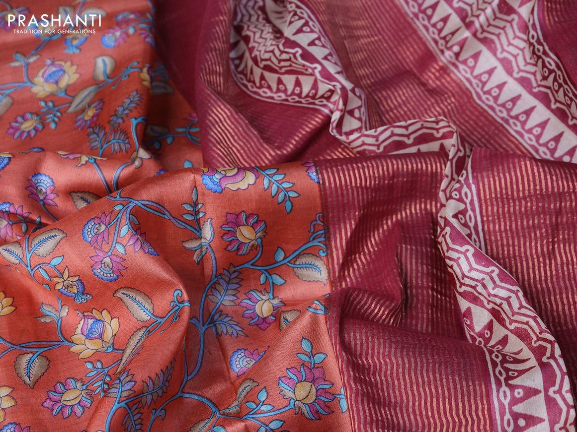 Pure tussar silk saree rustic orange and maroon with allover prints and zari woven border -
