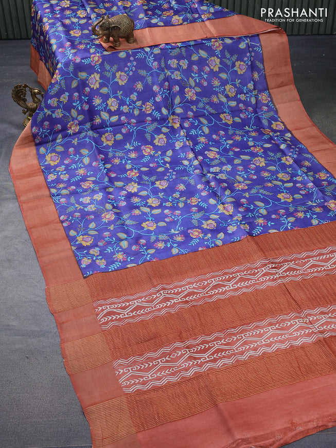 Pure tussar silk saree blue and rust shade with allover prints and zari woven border -