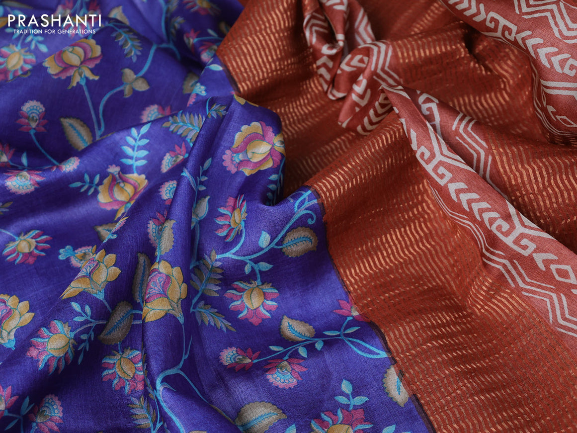 Pure tussar silk saree blue and rust shade with allover prints and zari woven border -