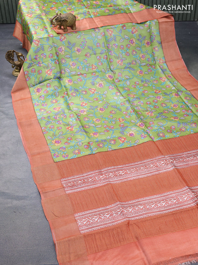 Pure tussar silk saree light green and rust shade with allover prints and zari woven border -