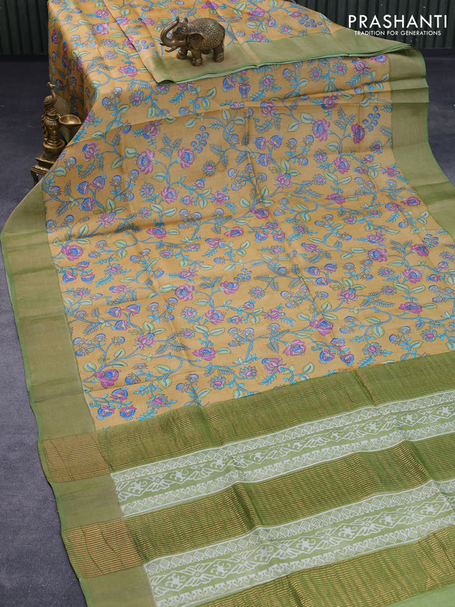 Pure tussar silk saree mustard yellow and green with allover prints and zari woven border -