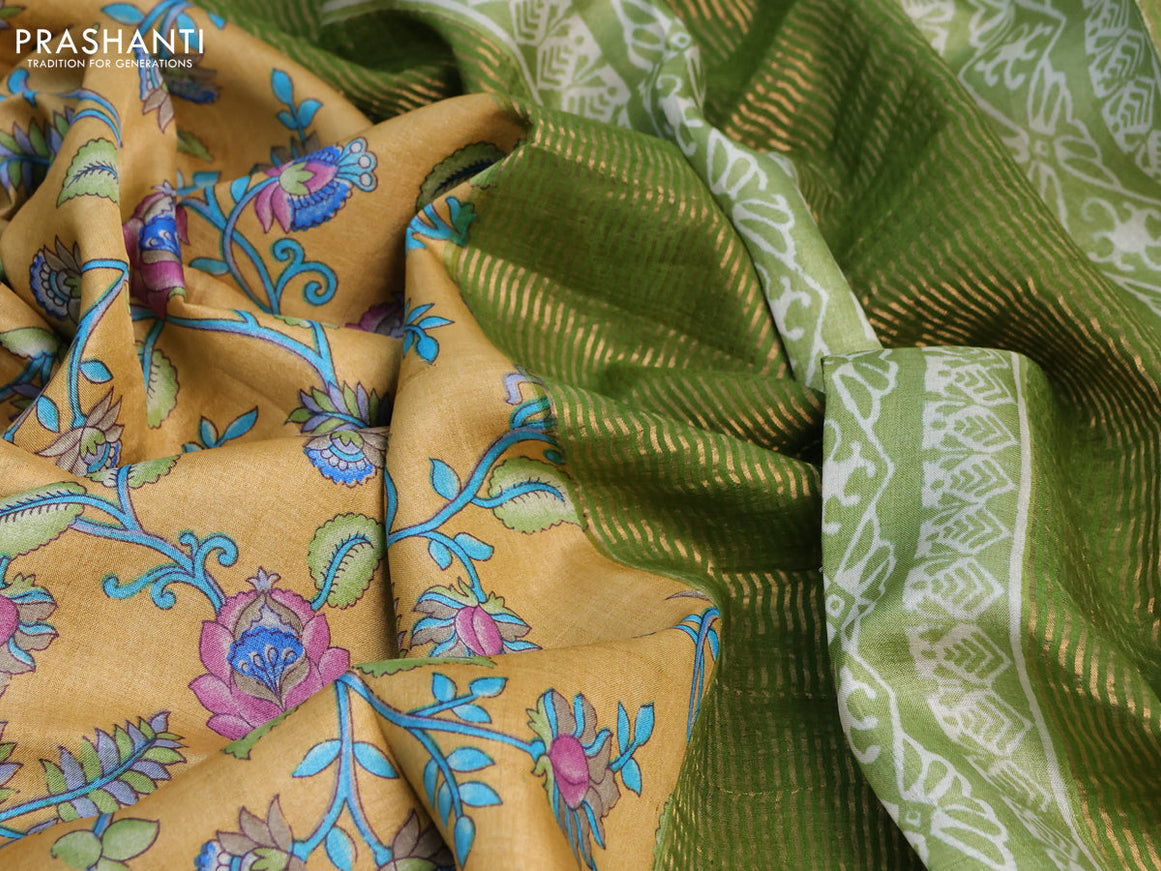 Pure tussar silk saree mustard yellow and green with allover prints and zari woven border -