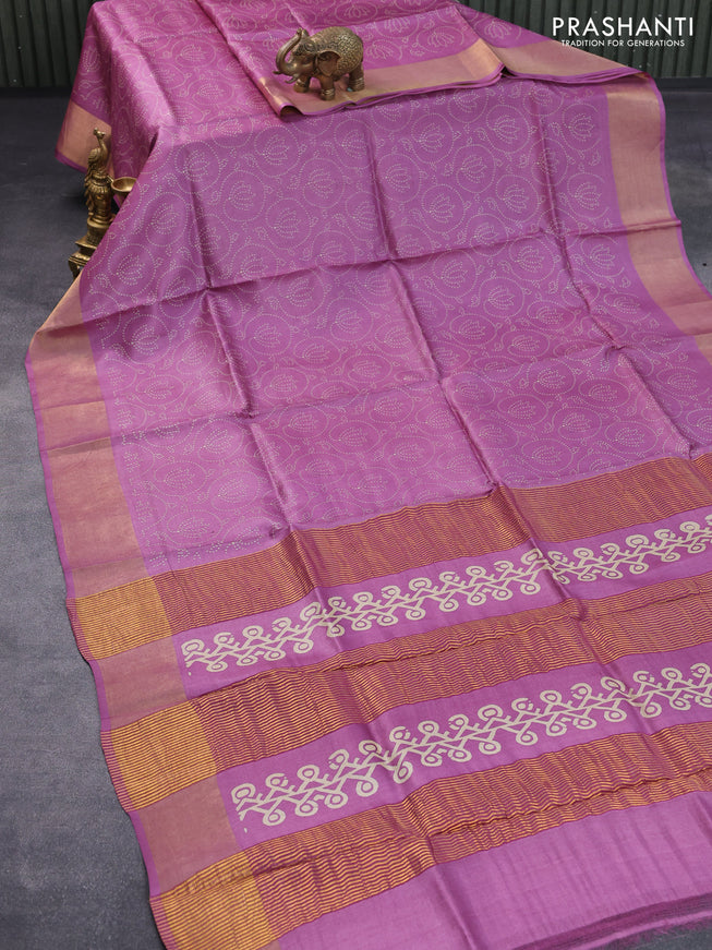 Pure tussar silk saree purple shade with allover prints and zari woven border -