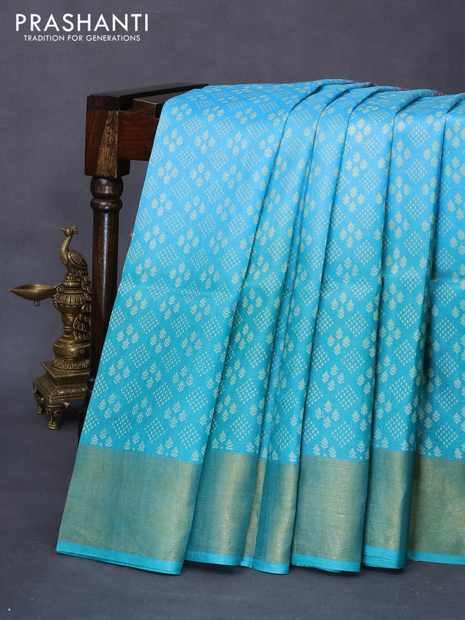 Pure tussar silk saree light blue and magenta pink teal blue with allover prints and zari woven border -