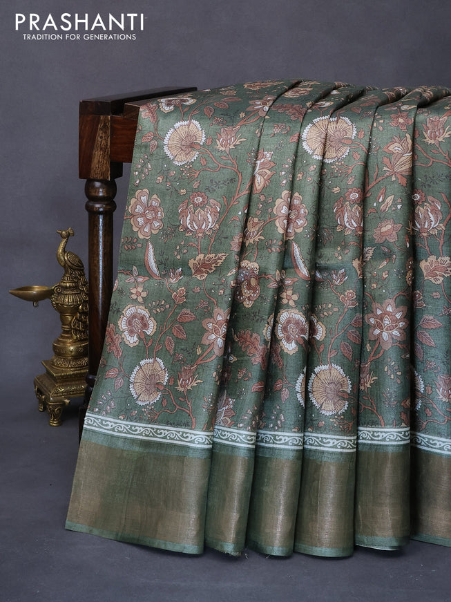 Pure tussar silk saree green shade with allover floral prints and zari woven border -