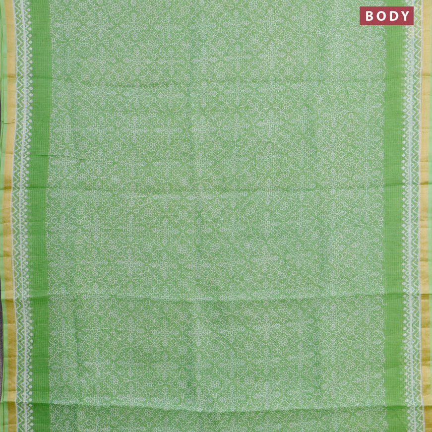 Kota saree light green with allover prints and zari woven border