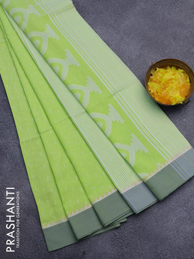 Khadi cotton saree fluorescent green with allover thread weaves and temple design simple border -