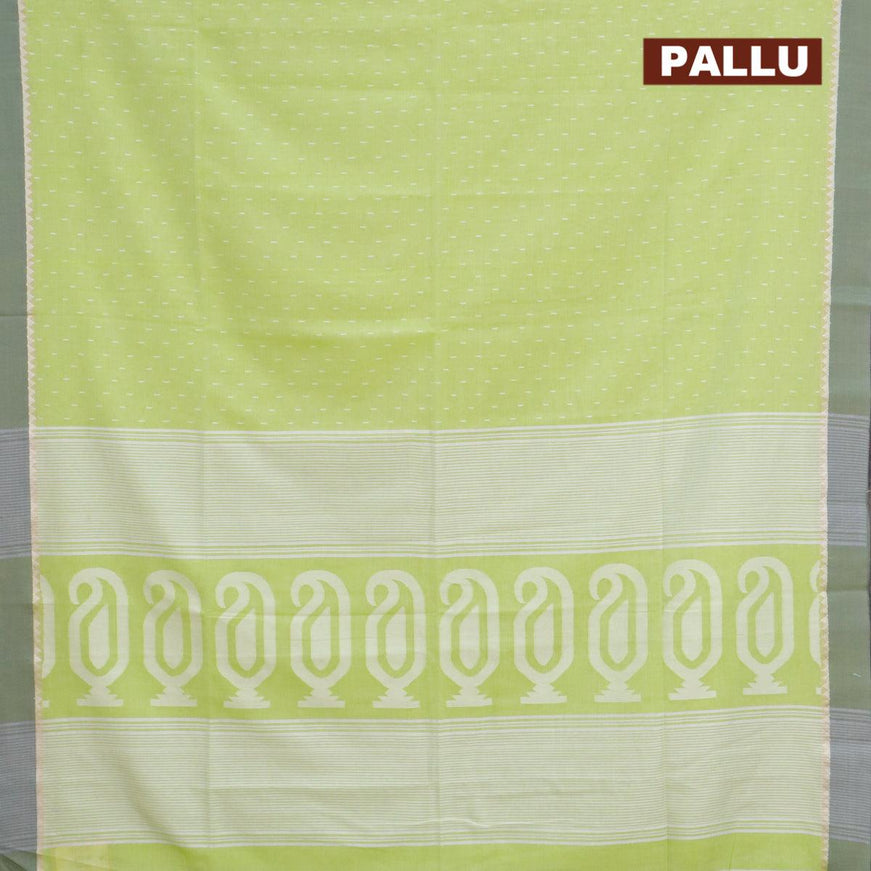 Khadi cotton saree fluorescent green with allover thread weaves and temple design simple border -