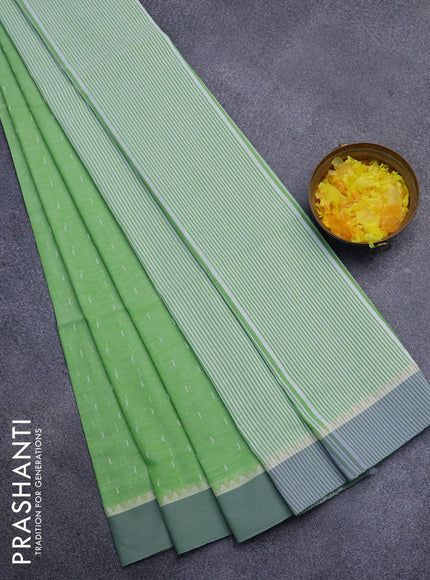 Khadi cotton saree light green with allover thread weaves and temple design simple border -