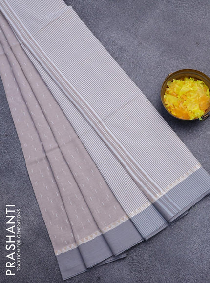 Khadi cotton saree pastel brown and grey with allover thread weaves and temple design simple border -