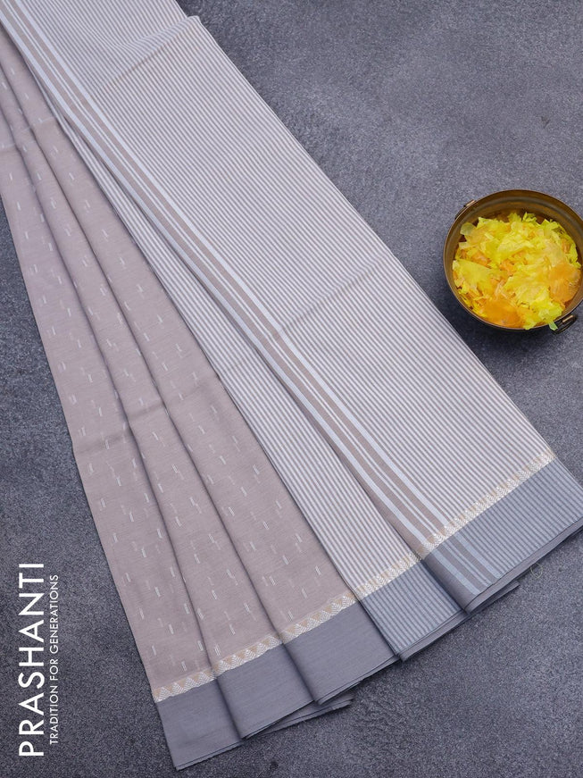 Khadi cotton saree pastel brown and grey with allover thread weaves and temple design simple border -