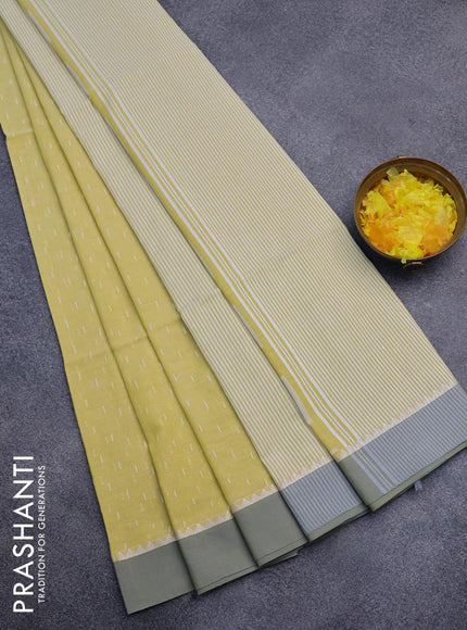 Khadi cotton saree yellow with allover thread weaves and temple design simple border -