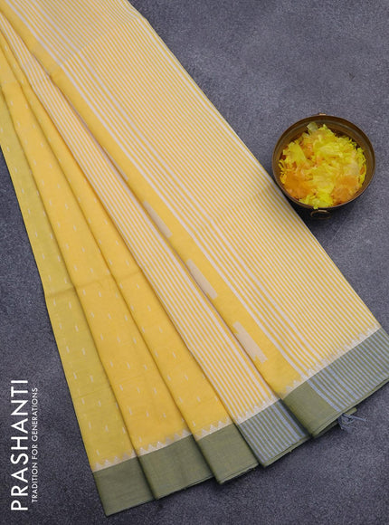 Khadi cotton saree yellow with allover thread weaves and temple design simple border -