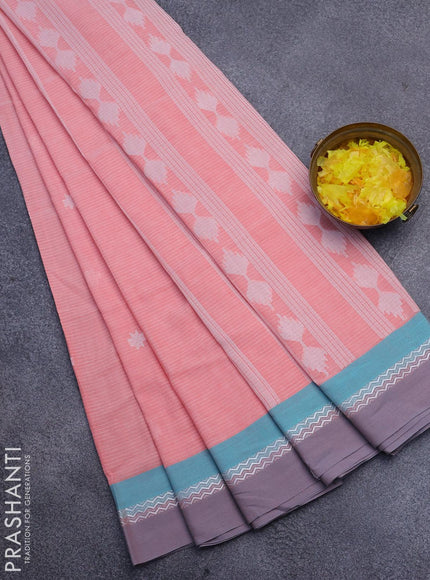 Khadi cotton saree peach orange with thread woven buttas and simple border -