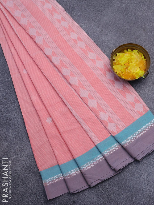 Khadi cotton saree peach orange with thread woven buttas and simple border -