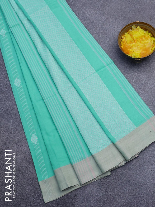 Khadi cotton saree teal green shade and beige with allover thread strips & buttas and simple border -