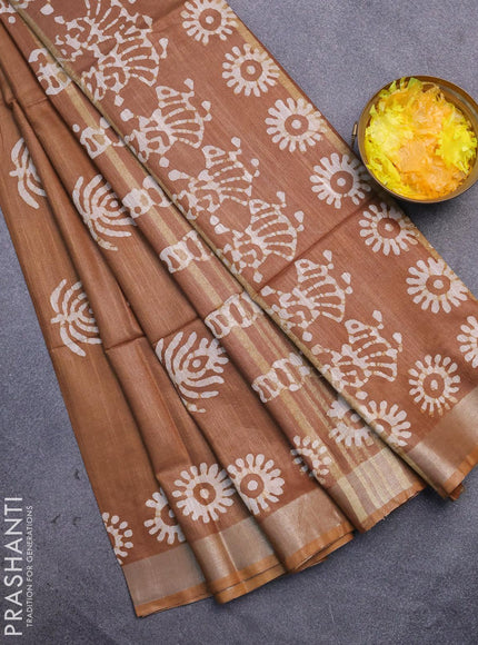 Linen cotton saree brown with allover batik butta prints and silver zari woven border