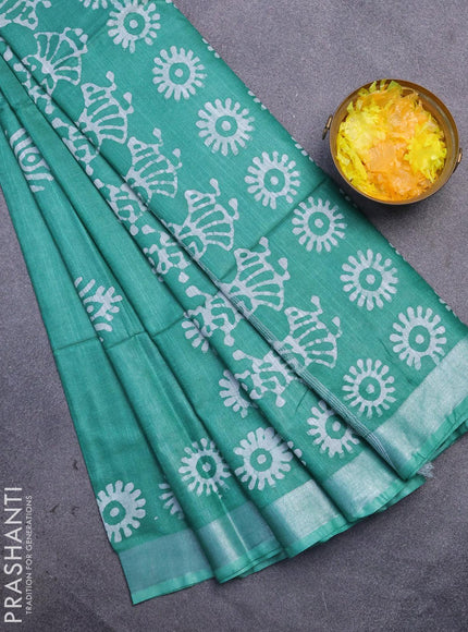 Linen cotton saree green with allover batik butta prints and silver zari woven border