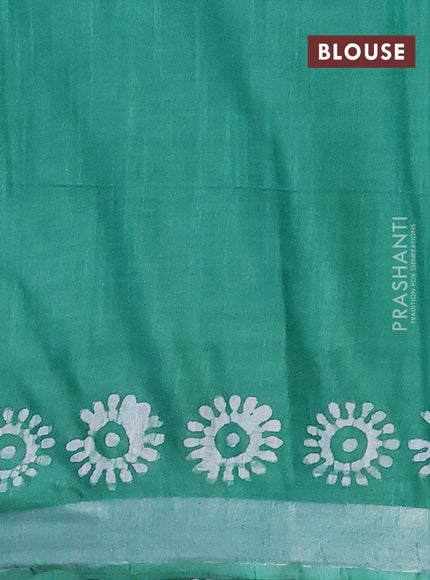 Linen cotton saree green with allover batik butta prints and silver zari woven border