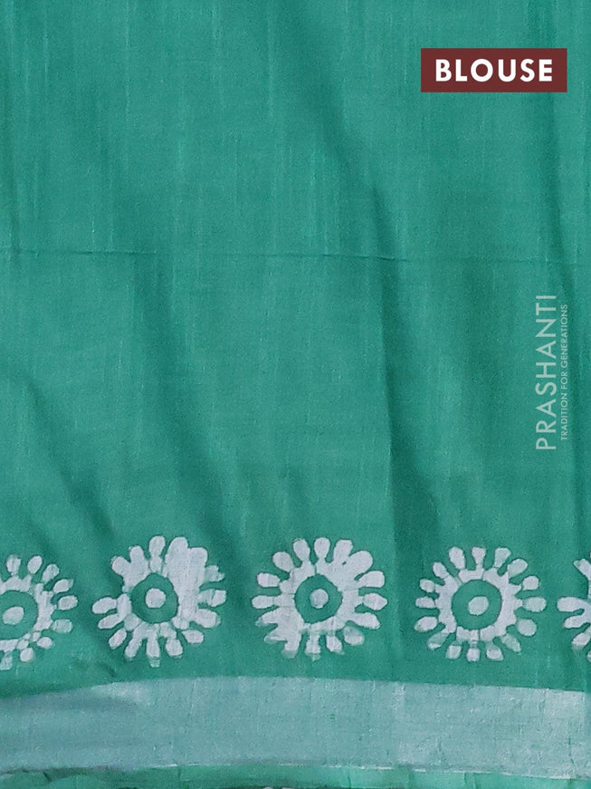 Linen cotton saree green with allover batik butta prints and silver zari woven border