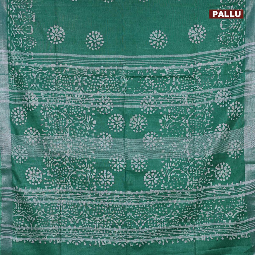 Linen cotton saree green with allover batik butta prints and silver zari woven border