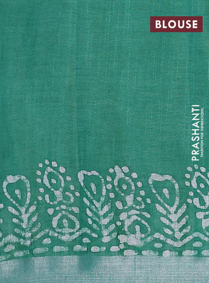 Linen cotton saree green with allover batik butta prints and silver zari woven border