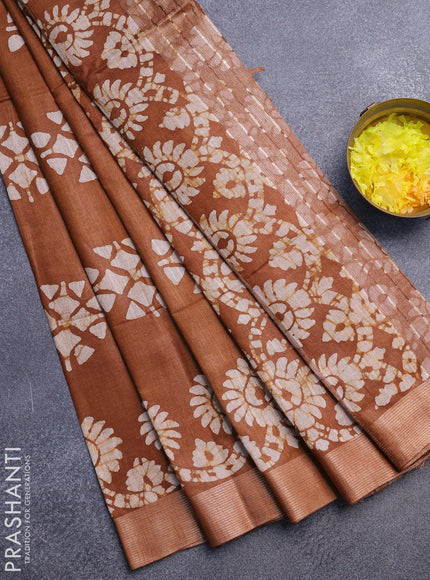 Linen cotton saree brown shade with allover batik butta prints and silver zari woven border