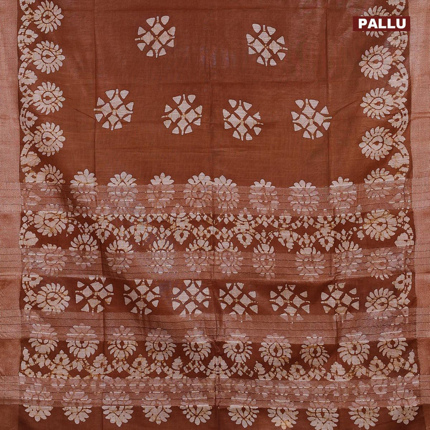 Linen cotton saree brown shade with allover batik butta prints and silver zari woven border